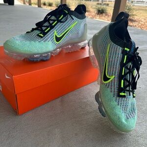 Nike Green and Black Athletic Shoes with Sleek Design